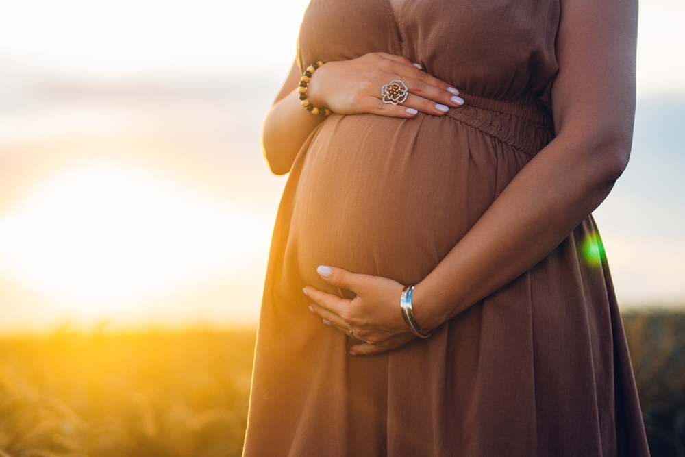 Pregnant,Woman,Caressing,Belly,On,Wheat,Natural,Field,Background.,Belly